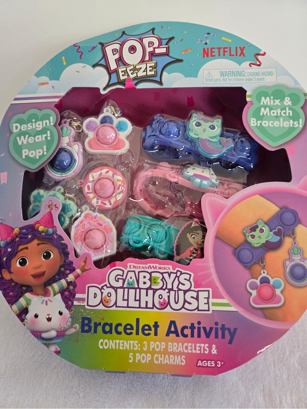 Gabby's Dollhouse Pop-Eeze Bracelet Activity Set - Pink, Blue & Teal